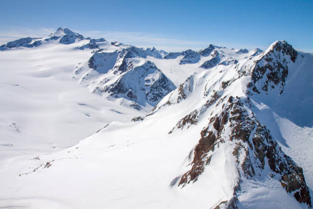 istock Winter snow covered mountain peaks Austrian alps 1009984234