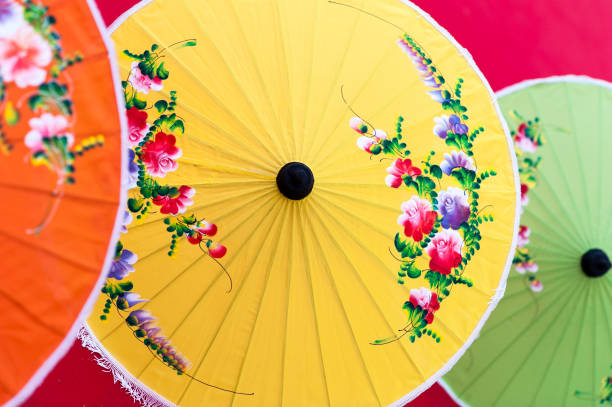 istock Oriental paper umbrellas of various colors. 1009987930