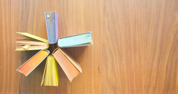 istock Books, panorama format, reading, learning, literature concept. 1009993728