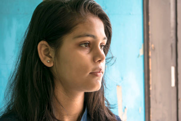 thoughtful girl looking away