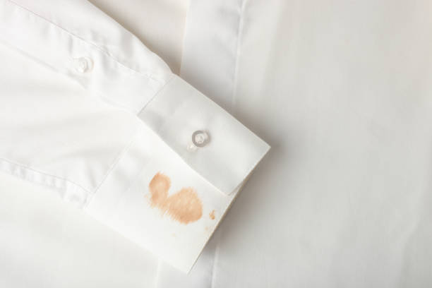 istock Dirty spot on the sleeve on white shirt 1010006958