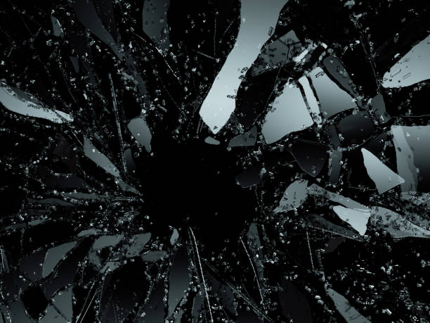 istock Pieces of Broken or Shattered glass on black. 3d illustration, 3d rendering 1010012280