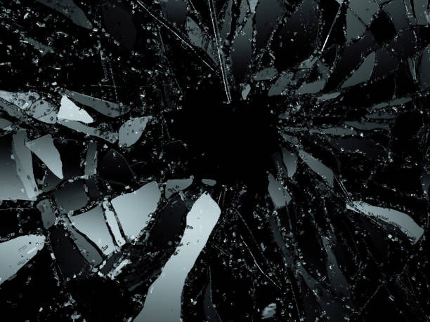 istock Pieces of Broken or Shattered glass on black. 3d illustration, 3d rendering 1010012284