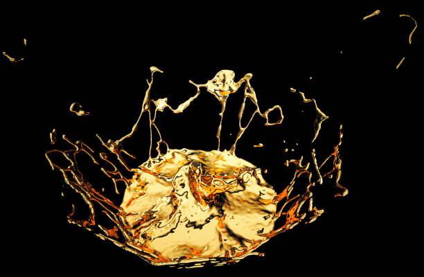 istock Liquid gold or oil splatter and splashes isolated on black. 3d render, 3d illustration 1010014442