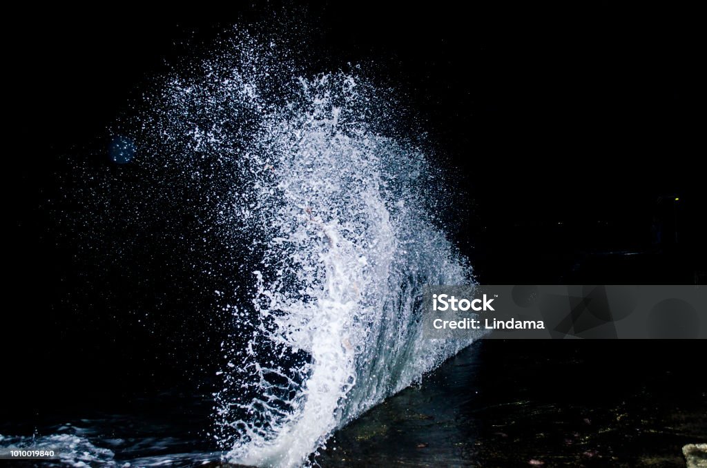 Splashing wave on the Black sea. Splashing wave on the Black sea in the night. Spray Stock Photo