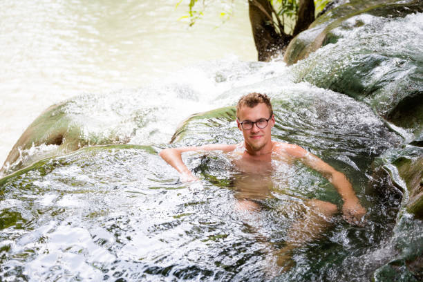 istock Tourist Krabi hot springs waterfall 1010019970