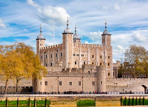 Daytime view of the Tower of London on the river Thames (England).