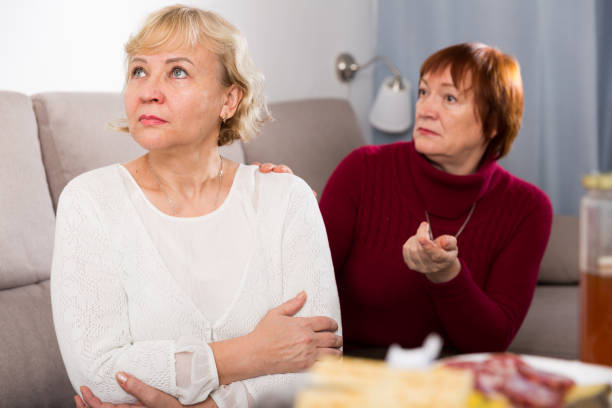 istock females quarreling in the room 1010023272