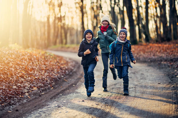 istock Happy children running in autumn 1010026130