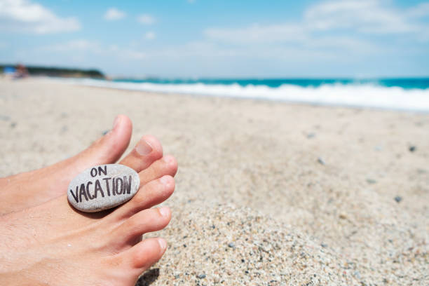 istock man on the beach and text on vacation 1010032146