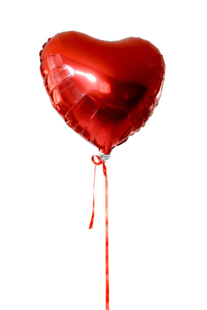 Balloon heart red inflatable heart cropped helium balloon stock pictures, royalty-free photos & images