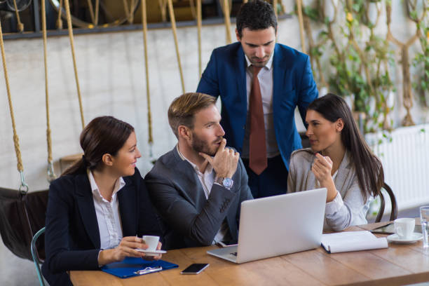 istock Business people brainstorming over new business project using laptop 1010032262