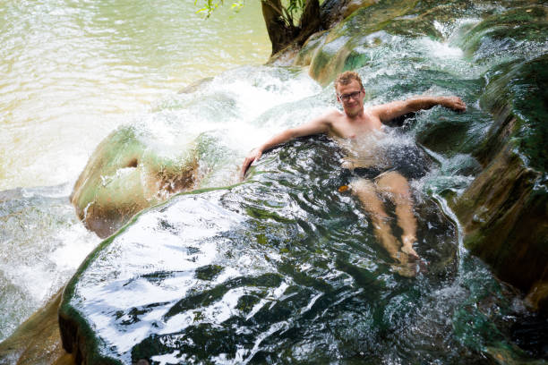 istock Tourist Krabi hot springs waterfall 1010032724