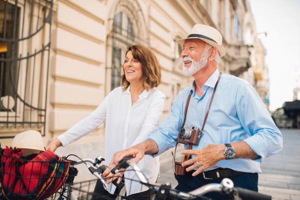 istock Smiling tourists riding bicycles 1010032964