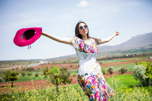 istock a young woman in the spring 1010035626