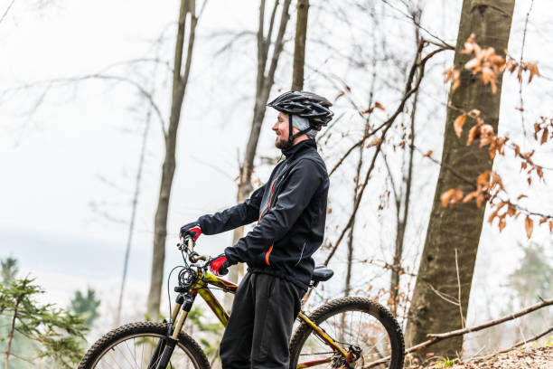 istock Mountain biker in the woods 1010036312