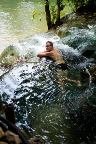 istock Tourist Krabi hot springs waterfall 1010036598