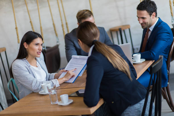 istock Business people brainstorming over new business project using laptop 1010036892