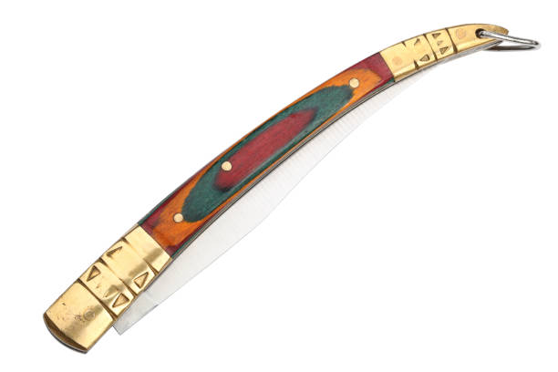 istock Old elegant decorative penknife in the folded state. Isolated on white background 1010045326