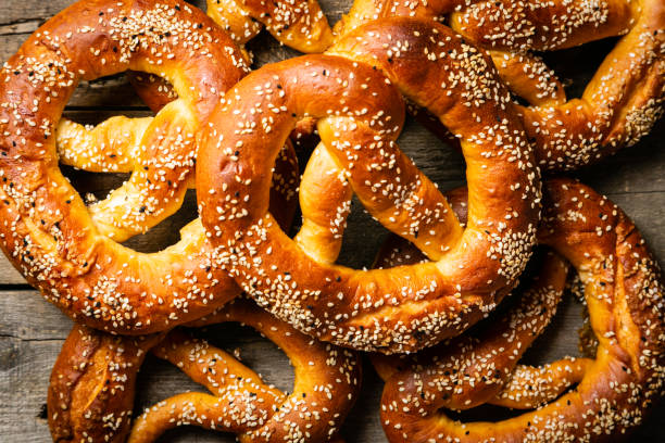 istock Beer Fest concept - pretzels on rustic wood background 1010048362