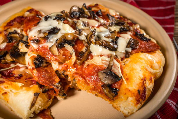 istock A piece of homemade pizza. 1010055124