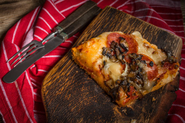 istock A piece of homemade pizza. 1010055978