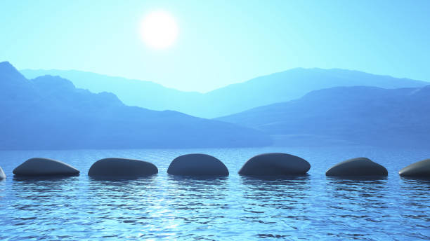 3D stepping stones in the ocean against a mountain landscape