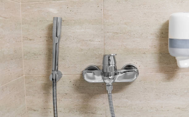 istock Shower and bath mixers in a bathroom. 1010074710