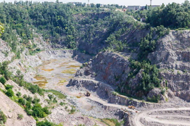 istock Extraction of mineral resources in the granite quarry 1010087998