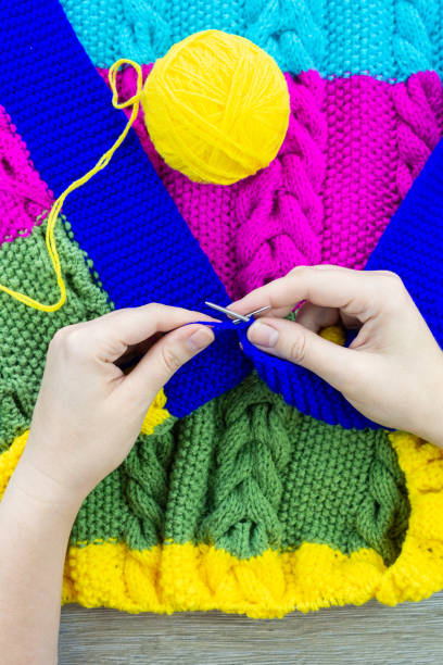 istock girl knits sock knitting needles 1010093808