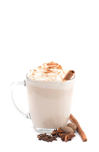 istock Spiced Drink with Cinnamon Stick on a White Background 1010100084