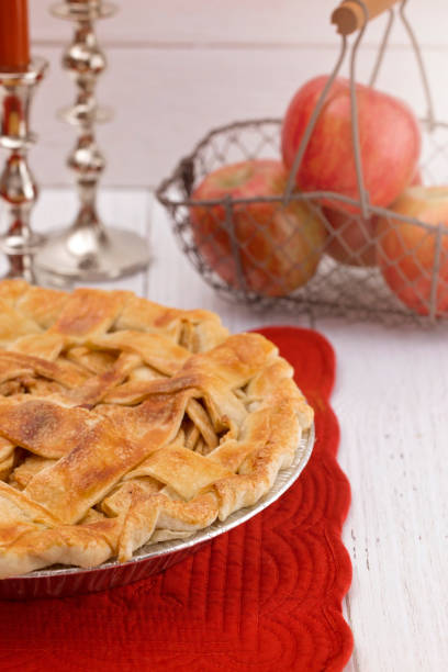 istock Homemade Apple Pie on a White Wood Table 1010100608