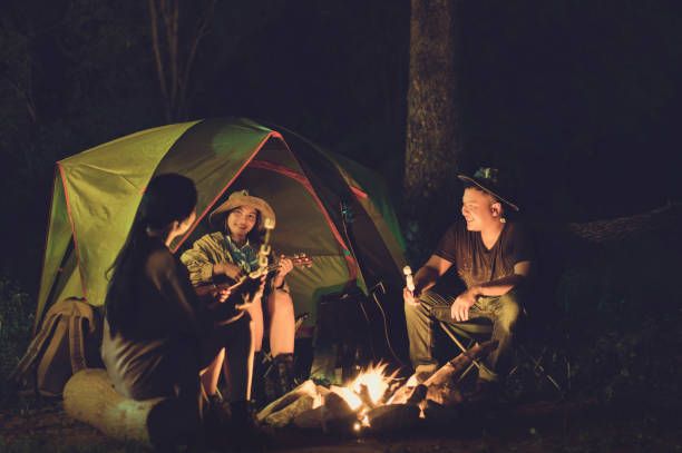 istock Friends are camping in the night. 1010105178