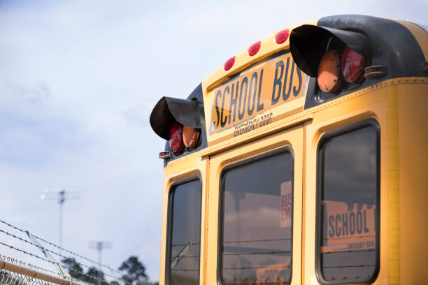 istock Back to School:  School bus parked at the bus barn. 1010118786