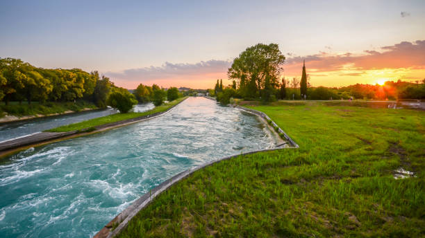 istock River Mincio, Veneto, Italy at sunset flowing towards Mantova 1010128804