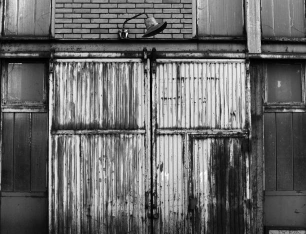 istock Rusted metal industrial door. 1010129146