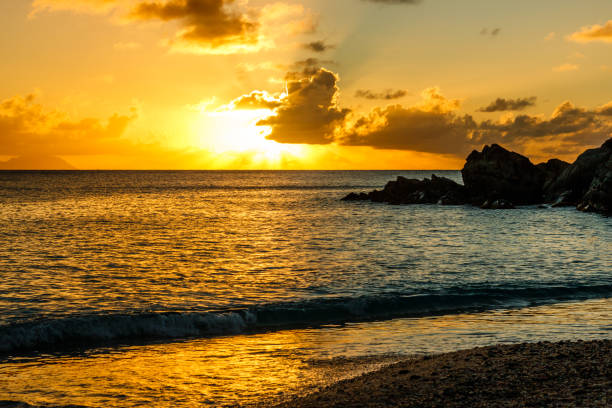 Travel photo in St. Barths, Caribbean. Amazing view of sunset on Shell Beach in Gustavia, Caribbean.