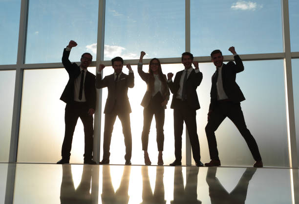 istock A group of people with great success holds 1010138854
