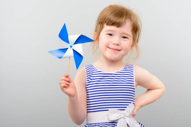 istock Cute girl with windmill toy 1010142848