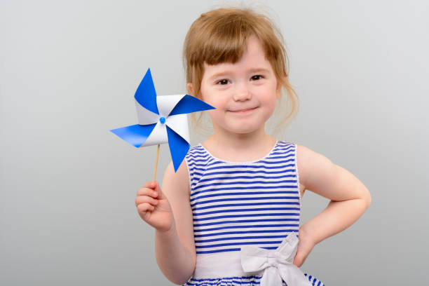 istock Cute girl with windmill toy 1010142860