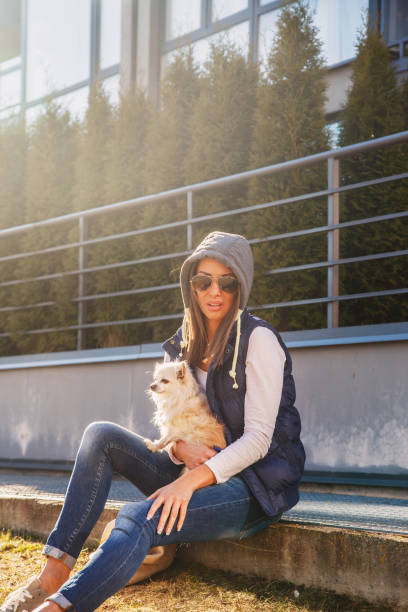 istock Casual girl with small dog 1010154652