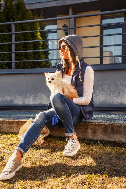 istock Casual girl with small dog 1010160130