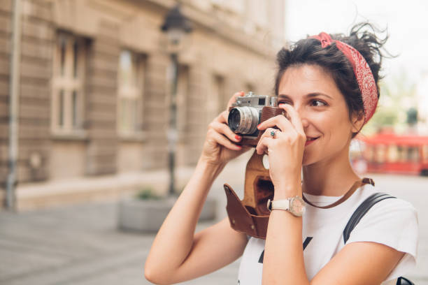 istock Female photographer on vacation 1010160782