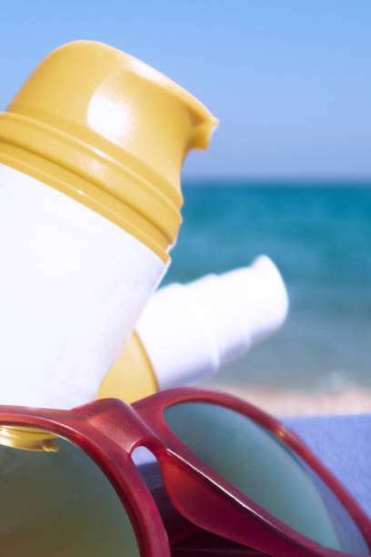 istock Sunscreen cream bottle on the sand 1010165968