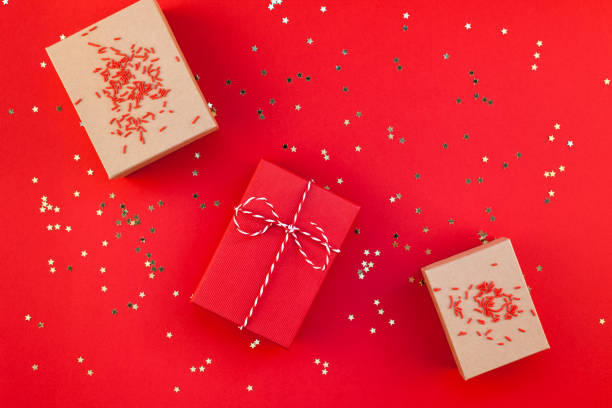 istock New Year or Christmas presents red background 1010169734