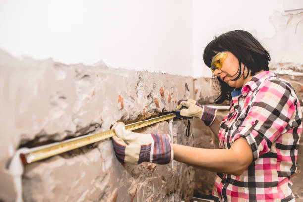 istock Woman using measuring tape 1010173260