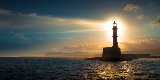 istock A beautiful night sky behind a shining lighthouse. Crete, Greece 1010175800
