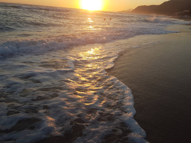 istock sunset sea waves and  foam splash  in summer Preveza Vrahos Greece 1010176252