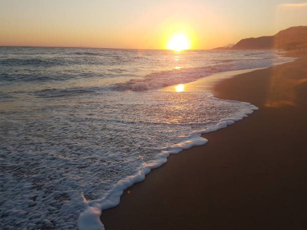 istock sunset sea waves and  foam splash  in summer Preveza Vrahos Greece 1010180034