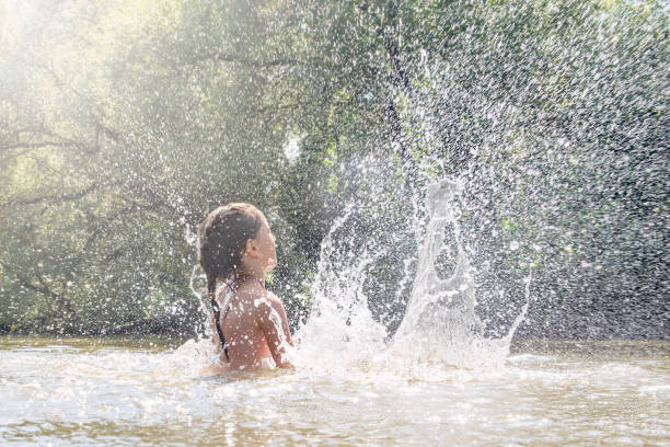 Girl playing in the water.